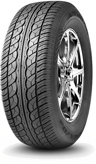 Car tire with alloy wheel on a white background